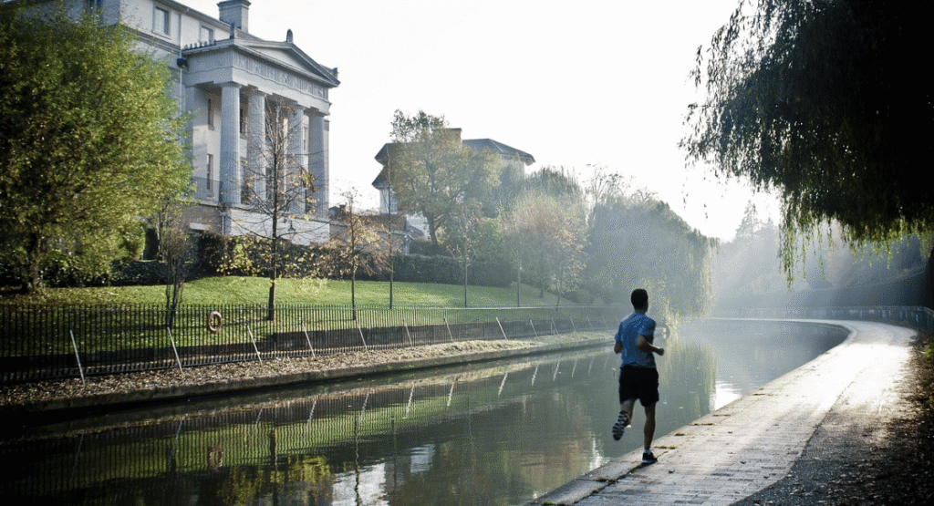 Busy professional exercising at home before work, showing how to stay fit with limited time